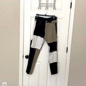 Black, white, and gray/brown patchwork pants